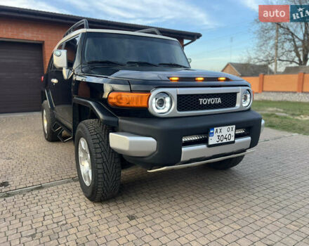 Черный Тойота ФЖ Крузер, объемом двигателя 4 л и пробегом 321 тыс. км за 21500 $, фото 1 на Automoto.ua