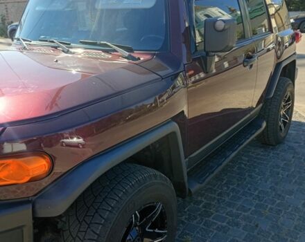 Красный Тойота ФЖ Крузер, объемом двигателя 4 л и пробегом 245 тыс. км за 19500 $, фото 2 на Automoto.ua