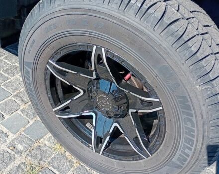 Красный Тойота ФЖ Крузер, объемом двигателя 4 л и пробегом 245 тыс. км за 19500 $, фото 4 на Automoto.ua