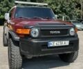 Красный Тойота ФЖ Крузер, объемом двигателя 4 л и пробегом 267 тыс. км за 16500 $, фото 1 на Automoto.ua