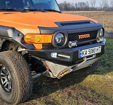 Оранжевый Тойота ФЖ Крузер, объемом двигателя 4 л и пробегом 265 тыс. км за 26500 $, фото 3 на Automoto.ua