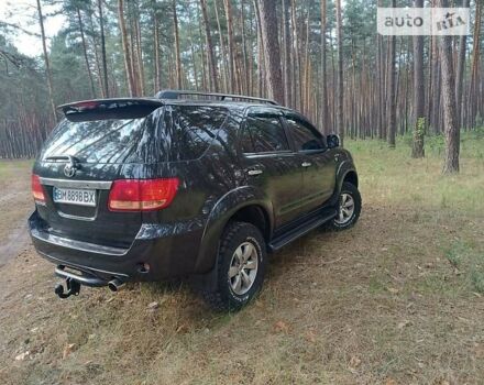 Тойота Фортунер 2005 у Лебедине на Automoto.ua Чорний Тойота Фортунер, об'ємом двигуна 4 л та пробігом 232 тис. км за 11700 $, фото 2 на Automoto.ua