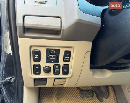 Черный Тойота Фортунер, объемом двигателя 3.96 л и пробегом 335 тыс. км за 14000 $, фото 17 на Automoto.ua