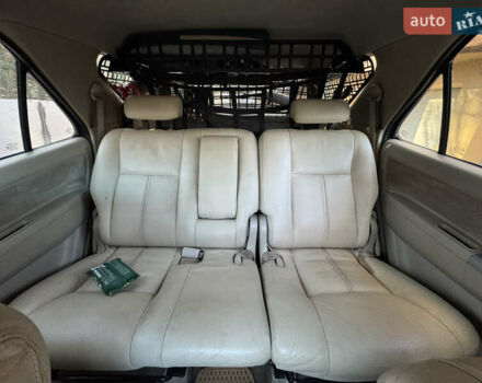 Черный Тойота Фортунер, объемом двигателя 3.96 л и пробегом 335 тыс. км за 14000 $, фото 21 на Automoto.ua