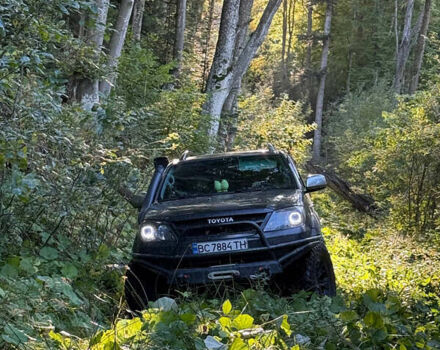 Черный Тойота Фортунер, объемом двигателя 3.96 л и пробегом 335 тыс. км за 14000 $, фото 2 на Automoto.ua