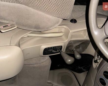 Черный Тойота Фортунер, объемом двигателя 2.7 л и пробегом 205 тыс. км за 11500 $, фото 16 на Automoto.ua