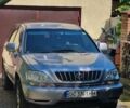 Сірий Тойота Харріер, об'ємом двигуна 3 л та пробігом 243 тис. км за 9500 $, фото 1 на Automoto.ua