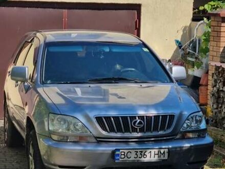 Сірий Тойота Харріер, об'ємом двигуна 3 л та пробігом 243 тис. км за 9500 $, фото 1 на Automoto.ua
