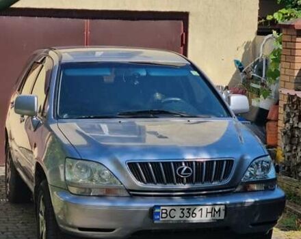 Сірий Тойота Харріер, об'ємом двигуна 3 л та пробігом 243 тис. км за 9500 $, фото 1 на Automoto.ua