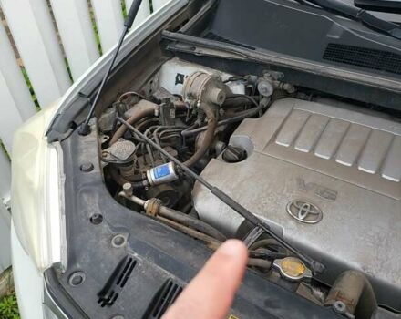 Белый Тойота Хайлендер, объемом двигателя 3.5 л и пробегом 207 тыс. км за 16500 $, фото 6 на Automoto.ua