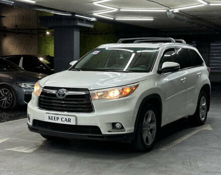 Белый Тойота Хайлендер, объемом двигателя 3.5 л и пробегом 145 тыс. км за 24800 $, фото 1 на Automoto.ua