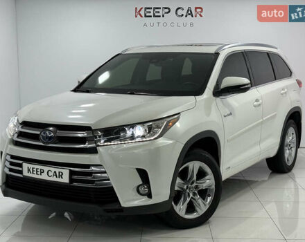 Белый Тойота Хайлендер, объемом двигателя 3.46 л и пробегом 100 тыс. км за 34000 $, фото 1 на Automoto.ua