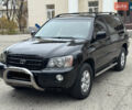 Чорний Тойота Хайлендер, об'ємом двигуна 3 л та пробігом 320 тис. км за 7400 $, фото 1 на Automoto.ua
