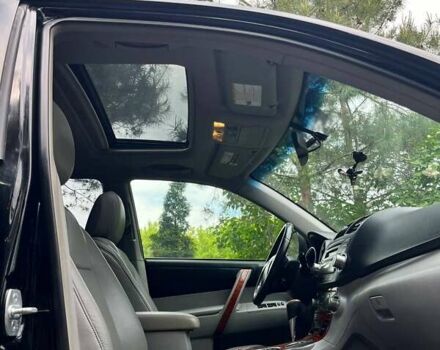 Черный Тойота Хайлендер, объемом двигателя 3.46 л и пробегом 253 тыс. км за 12900 $, фото 96 на Automoto.ua