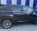 Черный Тойота Хайлендер, объемом двигателя 2.7 л и пробегом 128 тыс. км за 23500 $, фото 1 на Automoto.ua