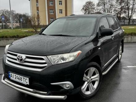 Черный Тойота Хайлендер, объемом двигателя 3.46 л и пробегом 320 тыс. км за 15600 $, фото 1 на Automoto.ua