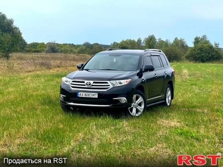Черный Тойота Хайлендер, объемом двигателя 3.5 л и пробегом 243 тыс. км за 15000 $, фото 1 на Automoto.ua