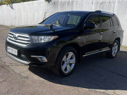 Черный Тойота Хайлендер, объемом двигателя 3.46 л и пробегом 185 тыс. км за 21600 $, фото 1 на Automoto.ua