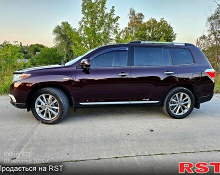 Красный Тойота Хайлендер, объемом двигателя 3.5 л и пробегом 199 тыс. км за 17500 $, фото 1 на Automoto.ua