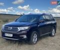 Красный Тойота Хайлендер, объемом двигателя 3.46 л и пробегом 230 тыс. км за 19000 $, фото 1 на Automoto.ua