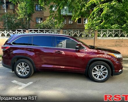 Красный Тойота Хайлендер, объемом двигателя 3.5 л и пробегом 215 тыс. км за 21000 $, фото 1 на Automoto.ua