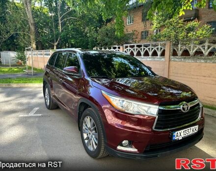 Красный Тойота Хайлендер, объемом двигателя 3.5 л и пробегом 215 тыс. км за 21000 $, фото 1 на Automoto.ua