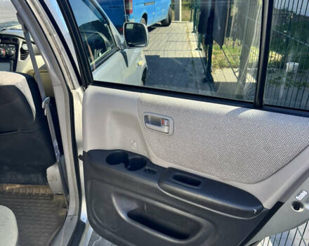 Серый Тойота Хайлендер, объемом двигателя 2.4 л и пробегом 300 тыс. км за 7700 $, фото 6 на Automoto.ua