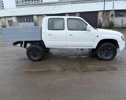 Білий Тойота Хайлюкс, об'ємом двигуна 2.5 л та пробігом 244 тис. км за 5000 $, фото 1 на Automoto.ua