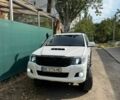 Білий Тойота Хайлюкс, об'ємом двигуна 3 л та пробігом 325 тис. км за 27000 $, фото 1 на Automoto.ua