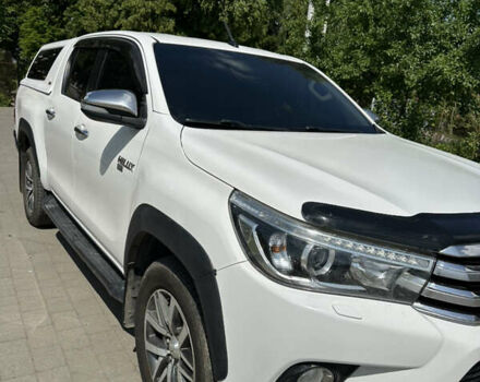 Белый Тойота Хайлюкс, объемом двигателя 2.8 л и пробегом 150 тыс. км за 32499 $, фото 1 на Automoto.ua
