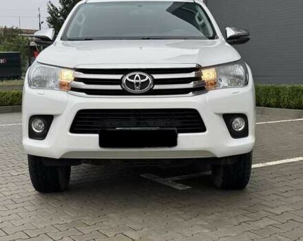 Білий Тойота Хайлюкс, об'ємом двигуна 2.39 л та пробігом 165 тис. км за 30500 $, фото 1 на Automoto.ua