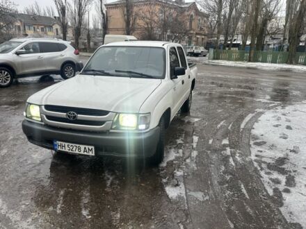 Білий Тойота Хайлюкс, об'ємом двигуна 2.4 л та пробігом 850 тис. км за 8850 $, фото 1 на Automoto.ua