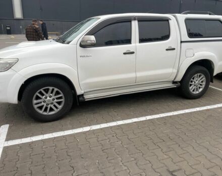 Белый Тойота Хайлюкс, объемом двигателя 3 л и пробегом 530 тыс. км за 22663 $, фото 1 на Automoto.ua