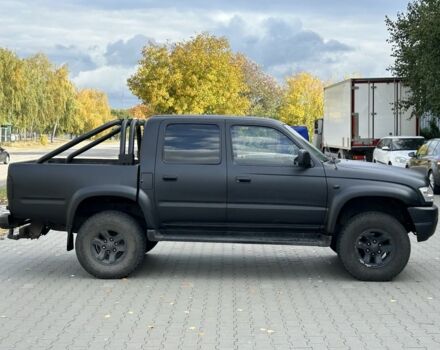 Чорний Тойота Хайлюкс, об'ємом двигуна 2.5 л та пробігом 200 тис. км за 5450 $, фото 1 на Automoto.ua