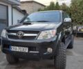 Черный Тойота Хайлюкс, объемом двигателя 3 л и пробегом 256 тыс. км за 3850 $, фото 1 на Automoto.ua