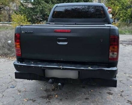 Черный Тойота Хайлюкс, объемом двигателя 2.5 л и пробегом 265 тыс. км за 9000 $, фото 1 на Automoto.ua