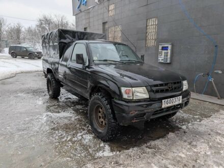 Черный Тойота Хайлюкс, объемом двигателя 2.5 л и пробегом 500 тыс. км за 4974 $, фото 1 на Automoto.ua