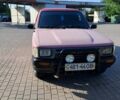 Красный Тойота Хайлюкс, объемом двигателя 2.4 л и пробегом 160 тыс. км за 5000 $, фото 1 на Automoto.ua