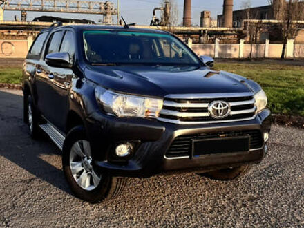 Серый Тойота Хайлюкс, объемом двигателя 2.4 л и пробегом 187 тыс. км за 25000 $, фото 1 на Automoto.ua