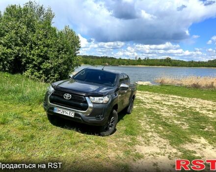 Сірий Тойота Хайлюкс, об'ємом двигуна 2.4 л та пробігом 166 тис. км за 33400 $, фото 1 на Automoto.ua