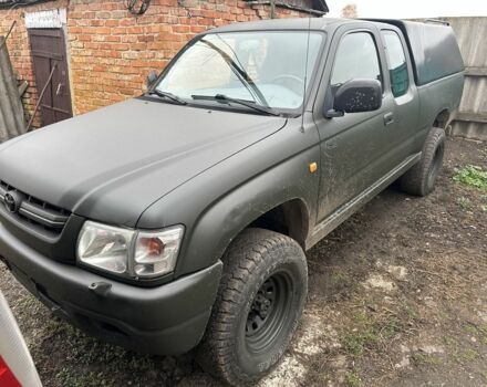 Зеленый Тойота Хайлюкс, объемом двигателя 3 л и пробегом 250 тыс. км за 6300 $, фото 1 на Automoto.ua