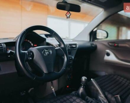 Черный Тойота АйКью, объемом двигателя 1 л и пробегом 34 тыс. км за 6000 $, фото 28 на Automoto.ua