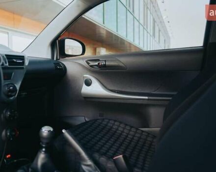Черный Тойота АйКью, объемом двигателя 1 л и пробегом 34 тыс. км за 6000 $, фото 22 на Automoto.ua
