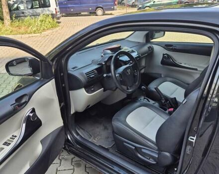 Черный Тойота АйКью, объемом двигателя 1.3 л и пробегом 149 тыс. км за 7500 $, фото 11 на Automoto.ua