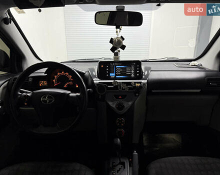 Чорний Тойота АйКью, об'ємом двигуна 1.33 л та пробігом 160 тис. км за 6999 $, фото 7 на Automoto.ua