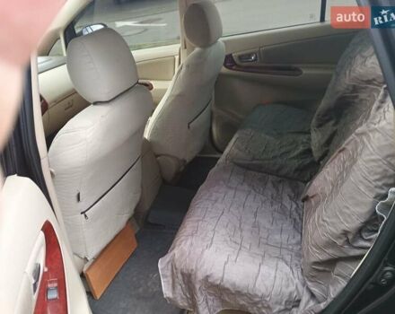 Чорний Тойота Інова, об'ємом двигуна 2.69 л та пробігом 213 тис. км за 7700 $, фото 7 на Automoto.ua