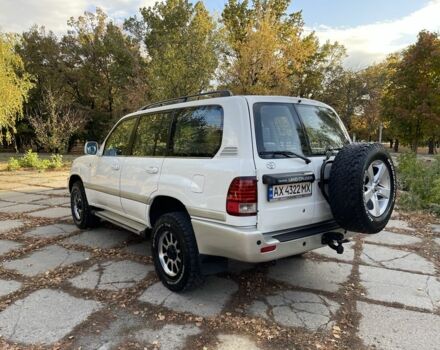 Білий Тойота Ленд Крузер 100, об'ємом двигуна 4.5 л та пробігом 330 тис. км за 15000 $, фото 5 на Automoto.ua