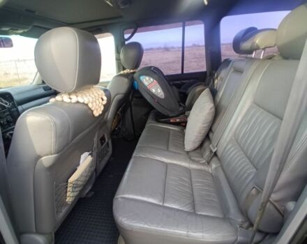 Черный Тойота Ленд Крузер 100, объемом двигателя 4.7 л и пробегом 442 тыс. км за 10000 $, фото 2 на Automoto.ua