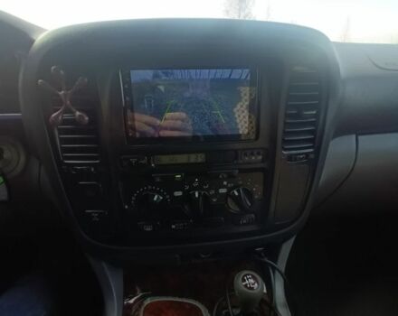 Черный Тойота Ленд Крузер 100, объемом двигателя 4.7 л и пробегом 442 тыс. км за 10000 $, фото 1 на Automoto.ua