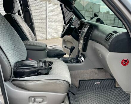 Черный Тойота Ленд Крузер 100, объемом двигателя 4.7 л и пробегом 386 тыс. км за 16800 $, фото 4 на Automoto.ua